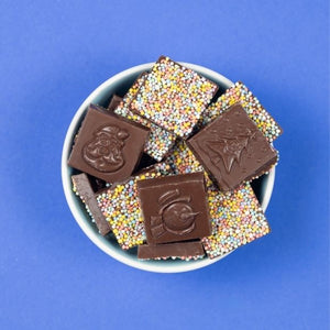 Christmas Squares Mylk Choc Sprinkles 100g